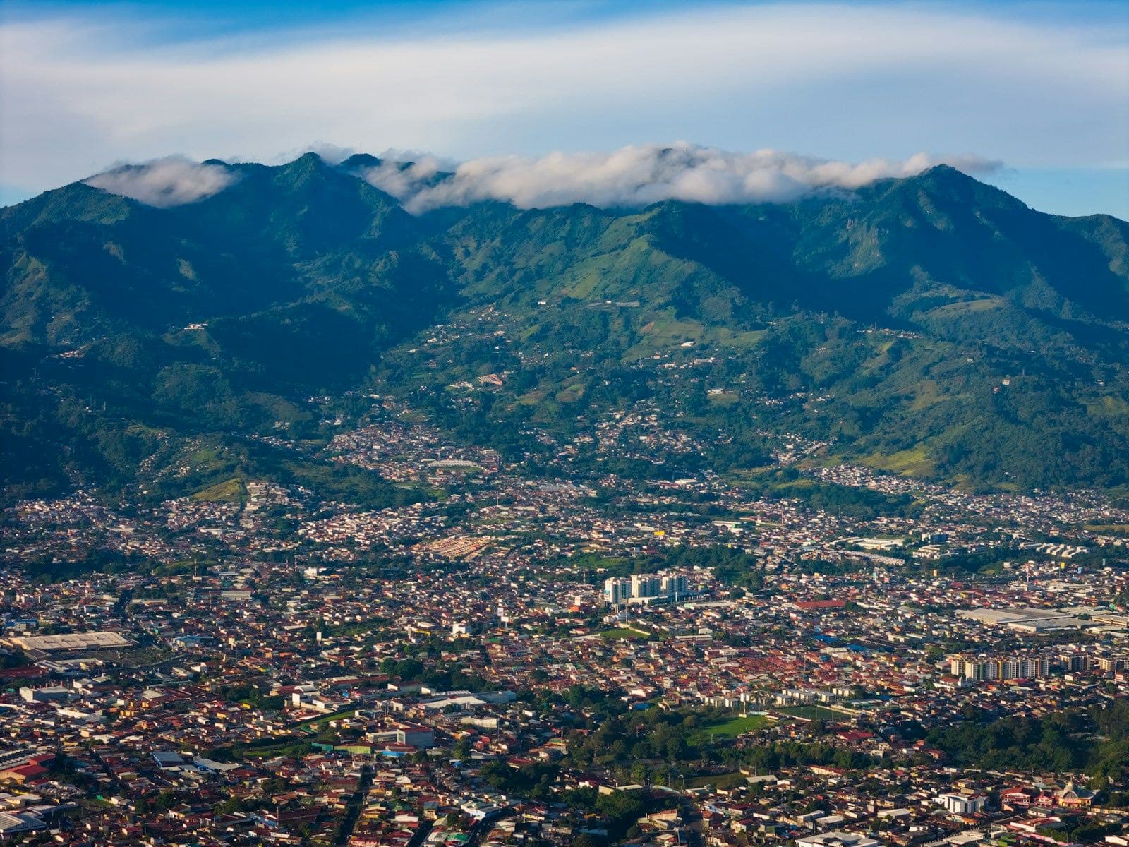Aerial view of San José, Costa Rica with the surrounding Central Valley mountains